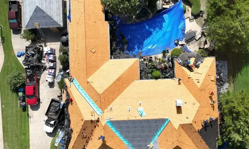 Professional Storm Damage Roof Repair being performed in Waco